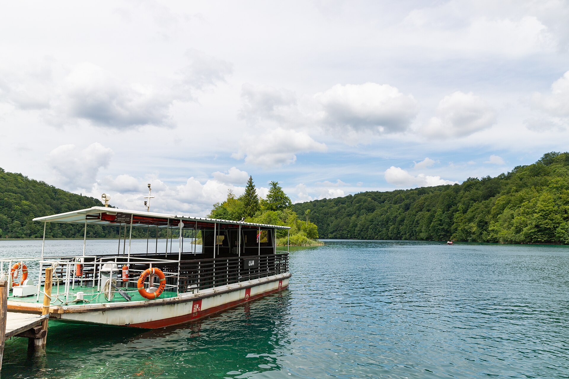 The electric boat at the dock on Lake Kozjak